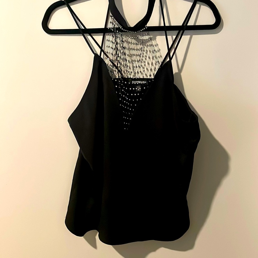 Sleeveless top. Going out top.